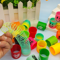 Mini jouet élastique amusant en plastique coloré avec visage souriant et cercle arc-en-ciel pour Noël et Halloween