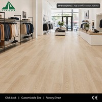Revêtement de sol Mfb 8mm ignifuge B1 super étanche AC6 en fibres minérales à cœur rigide, système clic, finition moderne lisse mate pour hôtels de luxe et espaces publics