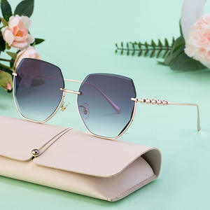 แว่นกันแดดสไตล์ยุโรปแบบครึ่งกรอบสำหรับผู้หญิง กรอบสีทอง ป้องกันรังสียูวี 400 เลนส์คลาส 2 เลนส์ไนลอน กรอบโลหะแผ่น - Product Image 5