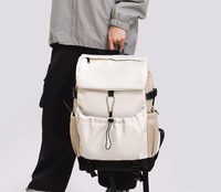 Nouveau sac à dos minimaliste uni, imperméable, léger, portable, avec fermeture éclair, pour les voyages décontractés, les trajets quotidiens, unisexe