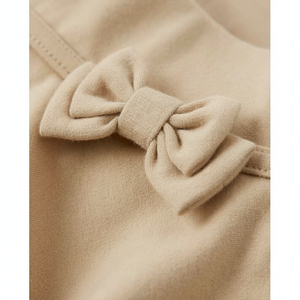 Skort de lazo clásico para niñas en uniforme escolar informal de verano bronceado con estilo clásico hecho de algodón de poliéster para niños de secundaria - Product Image 1