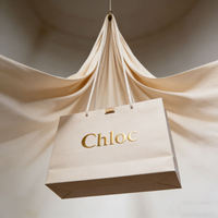 Sacs en papier kraft personnalisés pour le commerce de détail, sacs cadeaux pour vêtements, sacs d'emballage miniatures de luxe avec poignée, sacs en papier imprimés avec logos