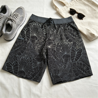 Short de bain pour hommes à imprimé feuilles tropicales hawaïennes, séchage rapide, avec cordon de serrage et poche latérale cargo, idéal pour la natation et le surf
