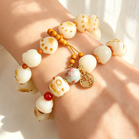 Bracelet en perles de Bodhi sculptées à la main en forme de patte de chat, style chinois, élastique, bijoux de mode, vente en gros