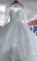 Robe de mariée de luxe 2026 entièrement ornée de cristaux, style robe de bal, manches longues transparentes, col rond illusion, grande taille, style africain, Vestido De Novia