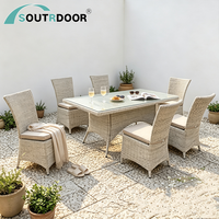 Ensemble table et chaises empilables modernes, durables, économiques, en aluminium et rotin, imperméables, pour hôtel et école, mobilier de salle à manger extérieure