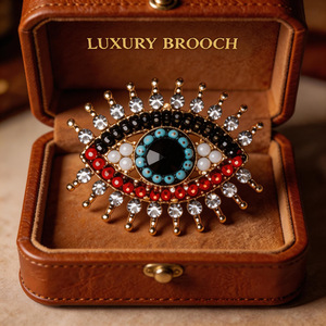 Broche de luxe œil porte-bonheur en alliage de zinc plaqué or avec strass en cristal, bijou unisexe tendance, cadeau - Product Image 1