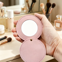 Miroir de poche rond en cuir PU, portable, à ouverture rabattable, mini miroir cosmétique pour femmes, pour les voyages et le maquillage quotidien