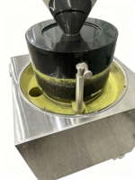 Moulin à thé matcha professionnel, moteur à engrenages, corps en basalte noir, construction en acier inoxydable, conception durable, économie d'énergie pour