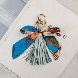 Porte-clés de sac à main pour femmes, tendance, en métal tissé à la main, écologique, durable, avec pendentif en forme de pompon, style coréen, vente chaude - Product Image 4