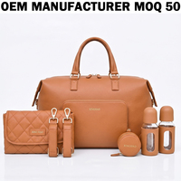 Sac à dos de maternité en cuir vegan OEM pour voyage, avec porte-bouteille et sangles pour les essentiels de soin de bébé