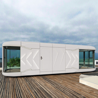 Capsule spatiale en acier technologiquement avancée, construction rapide, maison-conteneur flottante pour hôtels, maisons extérieures, alimentée à l'énergie solaire