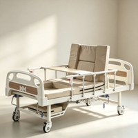 Lit médical multifonctionnel à dossier courbé avec trou pour toilettes, tête de lit en grain de bois et table à manger intégrée