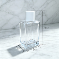 Flacon de parfum de luxe en verre transparent de 100 ml, vide, rectangulaire, cosmétique, avec base lourde et capuchon cylindrique blanc