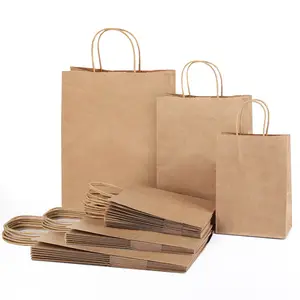 Intera vendita sacchetto di carta bianca kraft con manico sacchetti di carta per la spesa stampati personalizzati