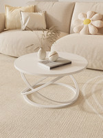 Table basse moderne, minimaliste, de luxe léger ; Table basse ronde en dalle de pierre simple et haut de gamme pour le salon ou le balcon