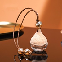 Vente en gros bouteille de diffuseur vide de voiture unique de luxe de haute qualité 6ml 8ml 10ml bouteille de parfum de voiture en bois suspendue