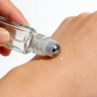 Bouteille roulante transparente personnalisée avec bouchon en bambou Bouteille roulante en verre pour huile essentielle avec billes roulantes en acier inoxydable