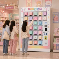 Distributeur automatique de blind boxes à 33 casiers avec affichage transparent, paiement par carte de crédit MDB/DEX, distributeur automatique de casiers OEM