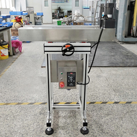 Élévateur vertical à serrage latéral automatique en SUS304 pour bouteilles et pots cosmétiques – Prix usine