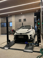 Équipement de stationnement automobile robuste et économique : Pont élévateur à quatre poteaux pour garage domestique, en vente