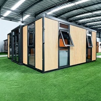 Maison conteneur à toit plat extensible sur mesure avec construction en panneaux sandwich en acier pour villas, maison préfabriquée