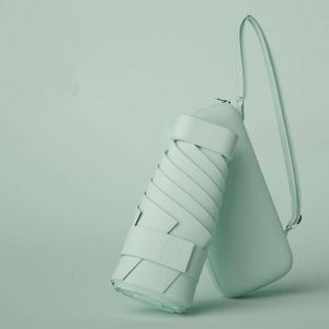 Parapluie miniature portable de voyage pour femmes, protection contre le soleil et la pluie, avec sac de transport - Product Image 1