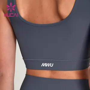 HUCAI Custom Logo Supportive U Neck Padded Training Running Yoga Contour Rib Corset Gym Sports Bra For Women