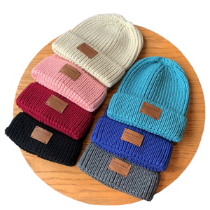 Gorro de pescador deportivo grueso para mujer y mujer, gorro de punto de Color blanco cálido acrílico enrollado con Logo personalizado Unisex - Product Image 1