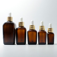 Botol Kaca Minyak Esensial Persegi Kecil Pabrik Xuzhou Pengiriman Cepat Grosir 10 Ml-100 Ml Botol Kosmetik Kaca Amber Kustom
