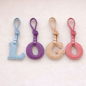 Porte-clés personnalisé brodé avec logo pour cadeaux promotionnels d'entreprise, de marketing client et de marketing d'entreprise - Product Image 1