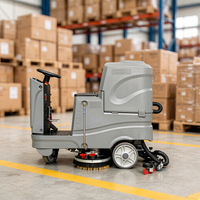 Autolaveuse et sécheuse de sols électrique autotractée à batterie pour le nettoyage commercial des sols durs dans les centres de distribution