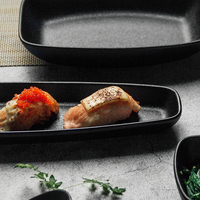 Assiette en céramique de luxe rectangulaire japonaise à long plateau de sushi noir en fonte pour restaurant