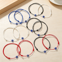 Bracelets de couple en corde tressée rouge en gros, bijoux avec breloques œil bleu porte-bonheur, bracelet réglable en cuir