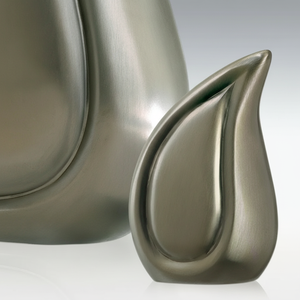 Silver Metal Teardrop Cremation Ashes Urn with Embossed Design Perfect for Mini <b>Keepsake</b> and Bulk Wholesale <b>Memorial</b> Supplies - Product Image 1