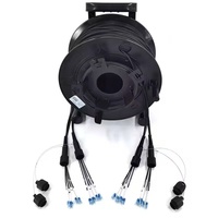 Bobine de câble à fibre optique tactique blindée rétractable portable 100M 150M pour diffusion en direct