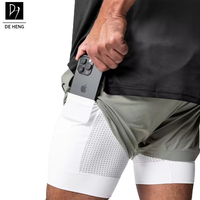 Dubbellaagse sport shorts voor heren met ingebouwde telefoonvak, ademend mesh, geschikt voor gym, hardlopen en fitness, casual shorts