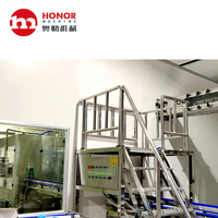Haute capacité entièrement automatique aérosol peinture machine de remplissage de l'eau Machine de remplissage de bureau eau de source machine de remplissage plas