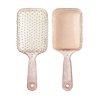 Peigne rond en nylon à dents larges pour le massage du cuir chevelu et le coiffage des cheveux, avec poignée à coussin d'air respirant et design suspendu, grand peigne pour filles