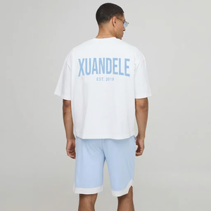 Conjunto de 2 piezas de algodón grueso estilo streetwear para hombre: camiseta oversize y pantalones cortos con logo gráfico personalizado, chándal holgado de verano - Product Image 1