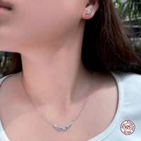 Bijoux en argent fin 925 Zircon cubique conception creuse ailes d'ange collier et boucle d'oreille ensemble pour dames cadeau de fête des mères