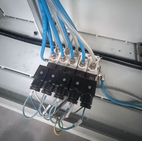 Machine de perçage et de fraisage CNC OUWO 3200 mm avec table rotative et moteur servo pour le traitement des trous et des profils en aluminium et en PVC.