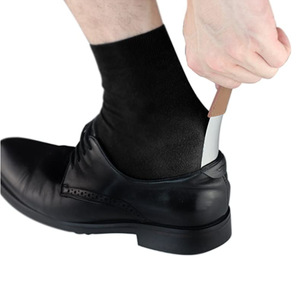 Wholesale supply of stainless steel and leather shoehorns, European and American style shoe-wearing aids, retro trendy shoe - Product Image 1