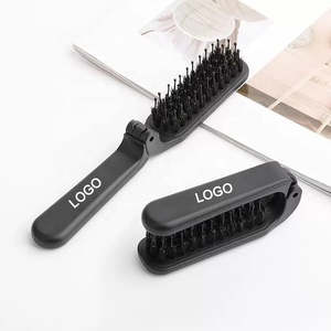 Al por mayor, peine y <span class=keywords><strong>cepillo</strong></span> para el cabello plegable portátil de viaje con logotipo personalizado, con cerdas de nailon y de jabalí, mango de plástico, para desenredar el cabello - Product Image 1