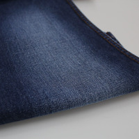 La mode ressemble à un tissu en denim lisse au toucher en coton polyester de 11.5oz
