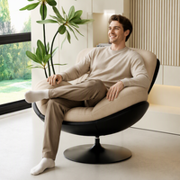 Fauteuil d'appoint pivotant à 360 degrés avec tissu tissé côtelé ivoire, coque moulée caramel et base en piédestal noir