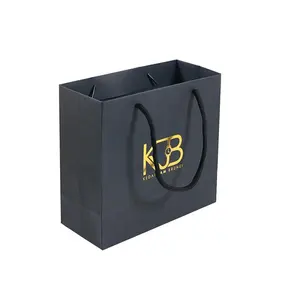 Biodegradable luxury matte black shopping packaging paper bags with custom your own logo gift retail handbag ribbon handle