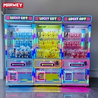 Marwey OEM ODM Machine à griffes transparente économique et populaire, à monnayeur, pour attrape-poupées, pour salle d'arcade commerciale