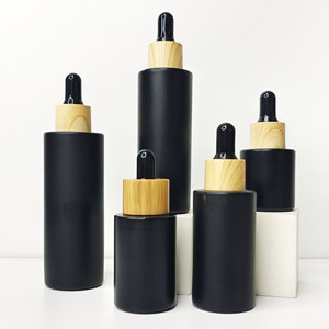 Wholesale 60ml Flat Shoulder <b>Essential</b> <b>Oil</b> Dropper Bottle Customizable Logo White Rubber Dropper Wood Grain Collar Glass Bottles - Product Image 5