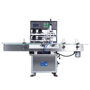 Machines de remplissage à 4 têtes pour pâte de sauce chili, shampoing, savon, bouteilles en plastique, jus d'orange, miel, parfum et boissons alcoolisées - Product Image 1